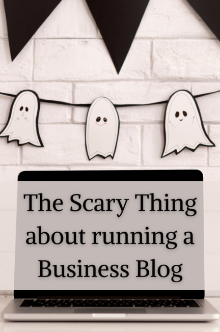 the words The Scary Thing about running a Business Blog over a laptop on a scary desk